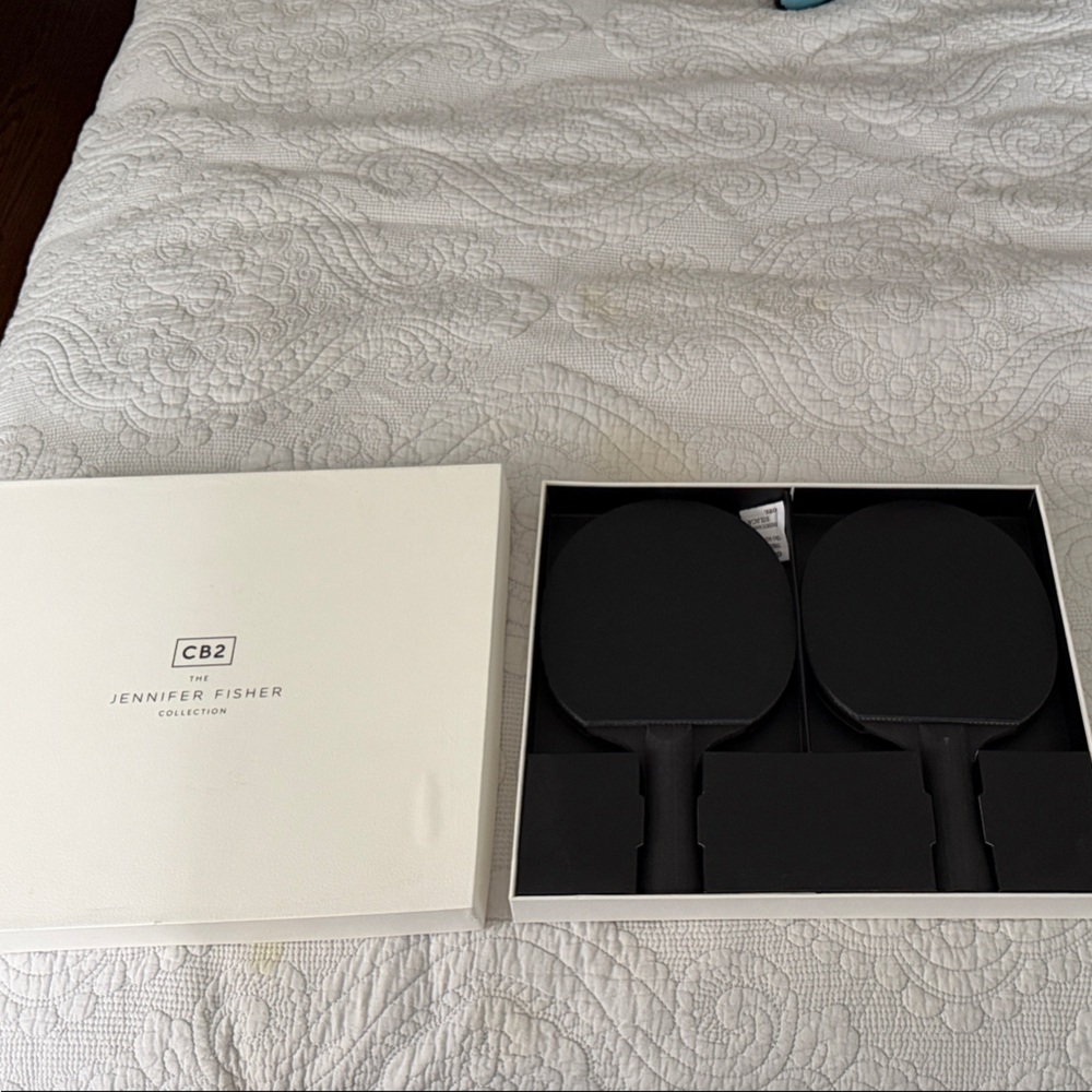 Cb2 Matte black ping pong paddles